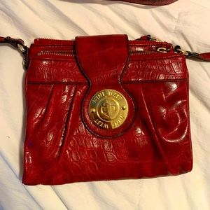 Nine West Red mini bag, great for wearing over the shoulder. Adjustable strap
